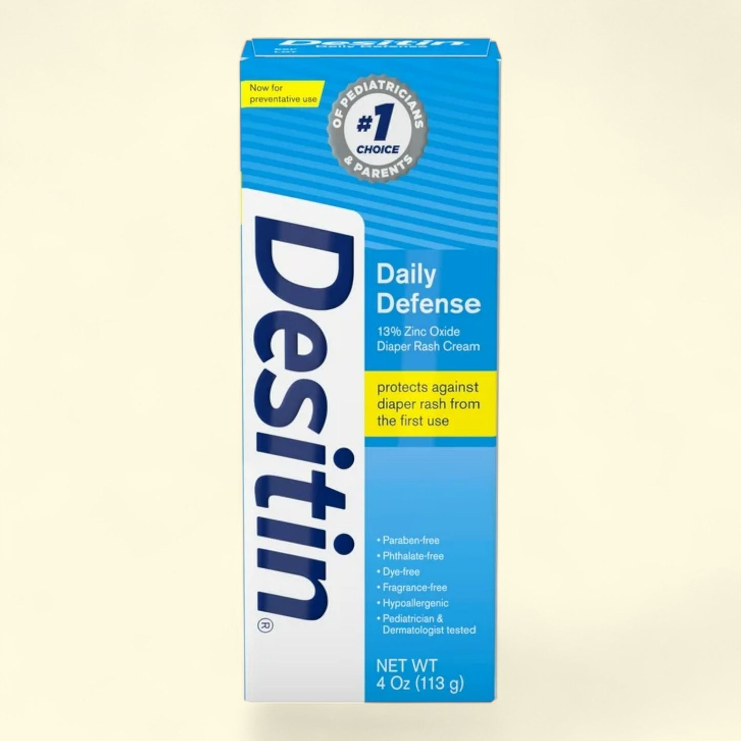 Desitin Daily Defense diaper rash cream box on a beige background