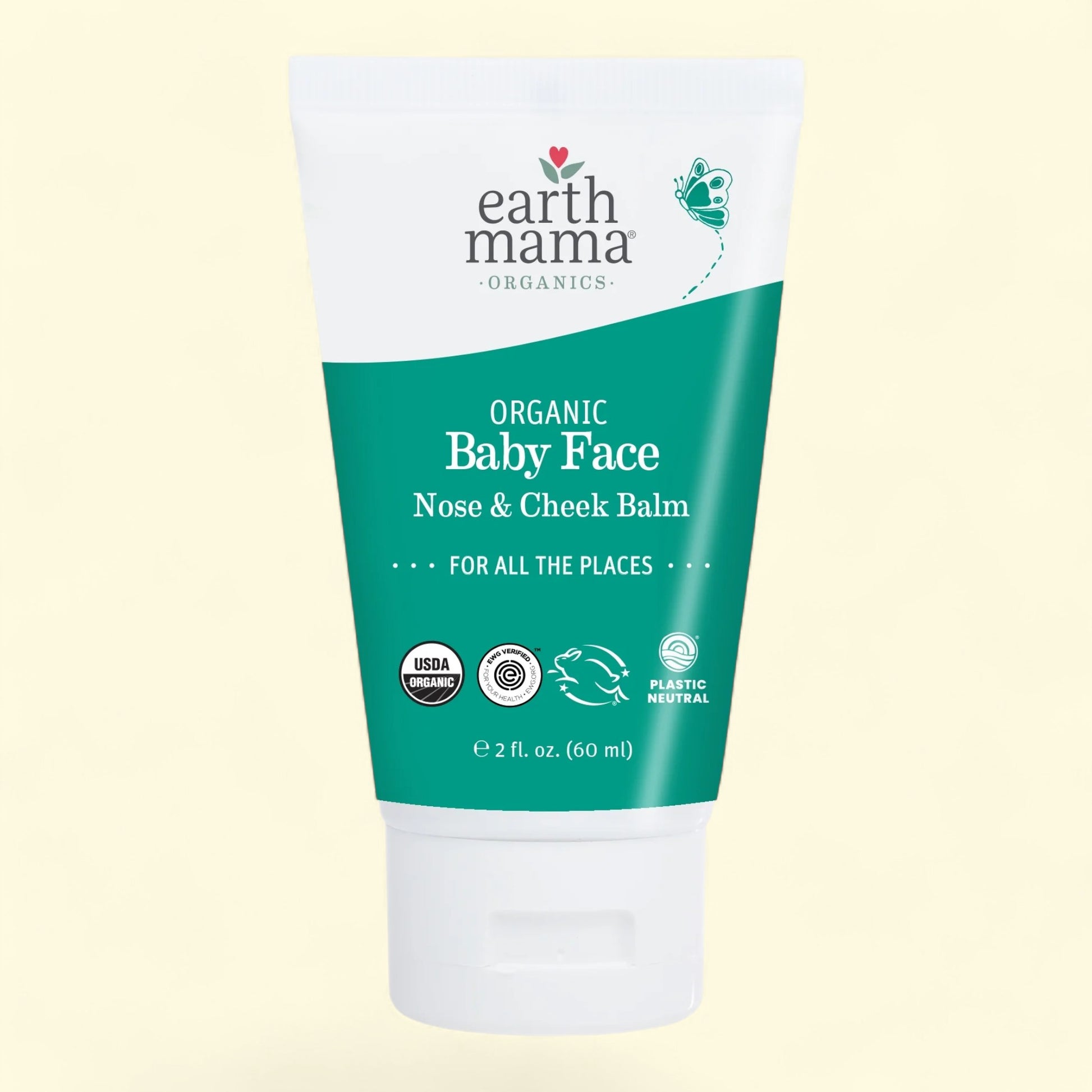 Earth Mama Organics Organic Baby Face Nose & Cheek Balm on a light yellow background
