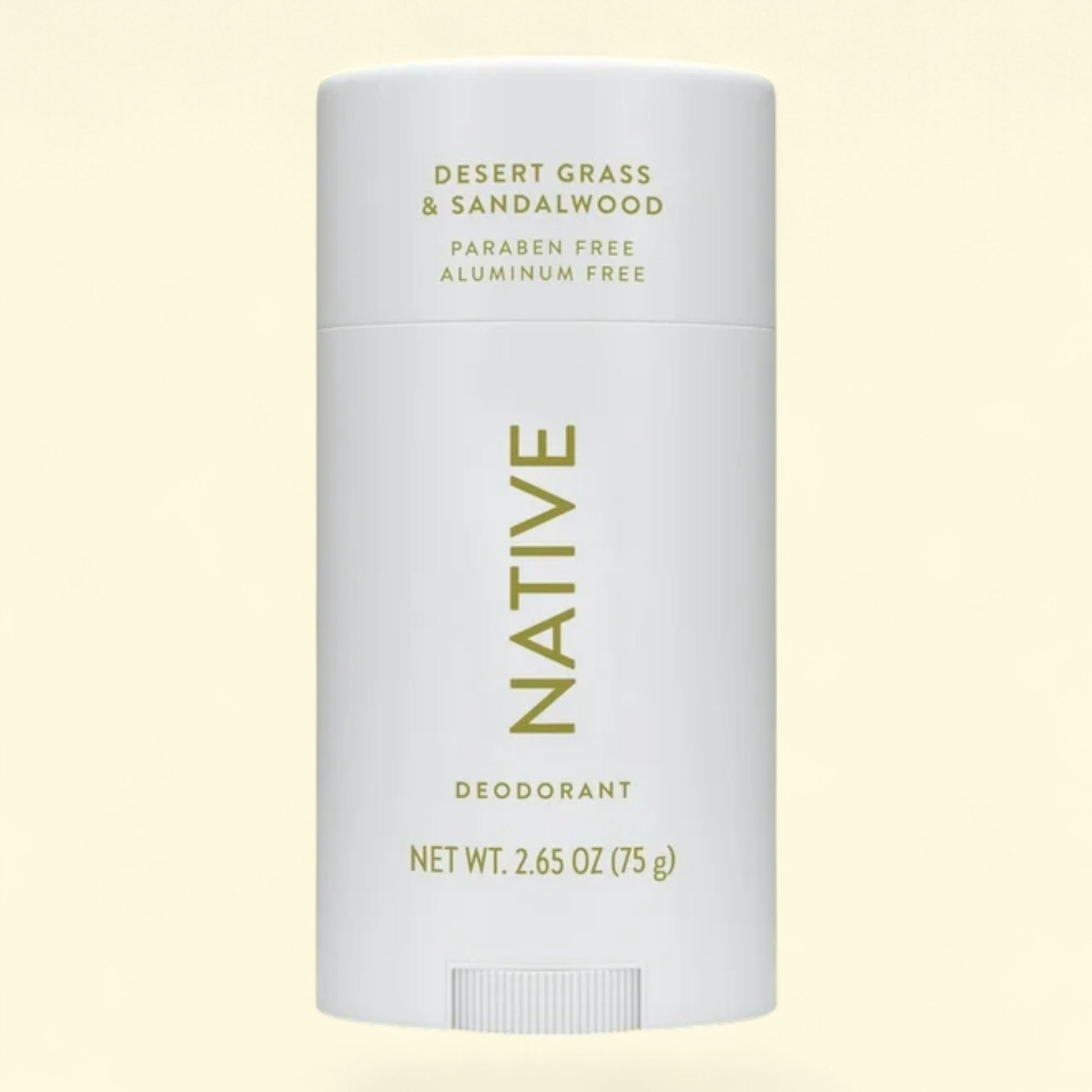 Native deodorant stick on a light yellow background