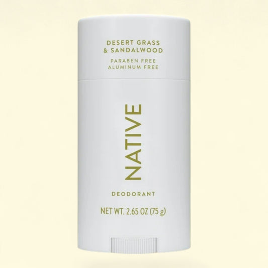 Native deodorant stick on a light yellow background