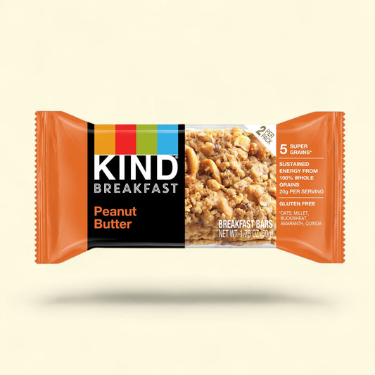 Kind Peanut Butter Breakfast Bar packaging on a beige background
