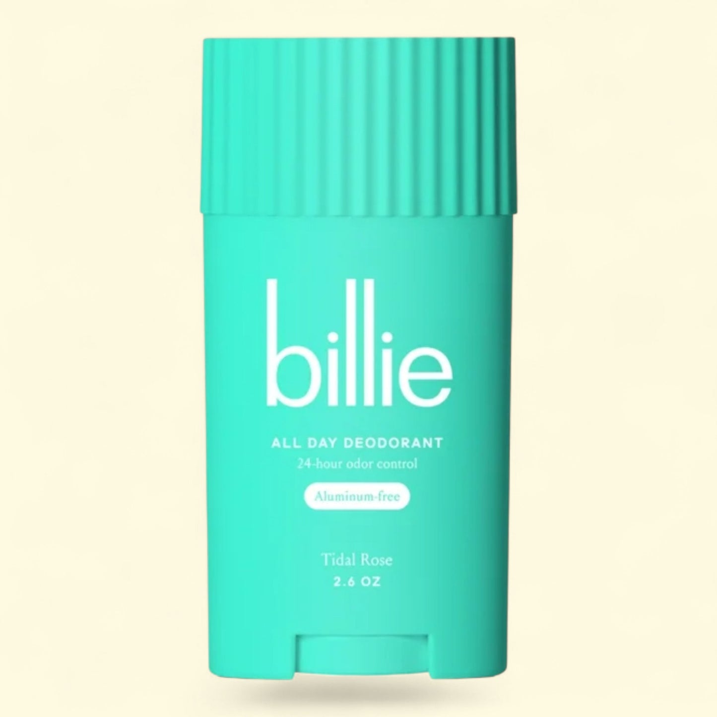Teal 'billie' deodorant stick on a beige background