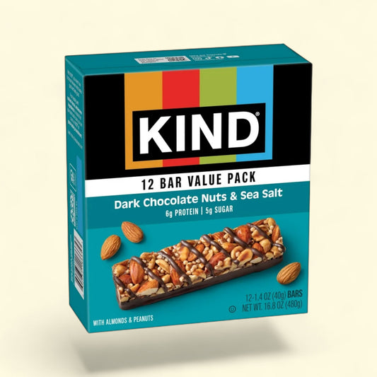 KIND Dark Chocolate Nuts & Sea Salt bars on a beige background