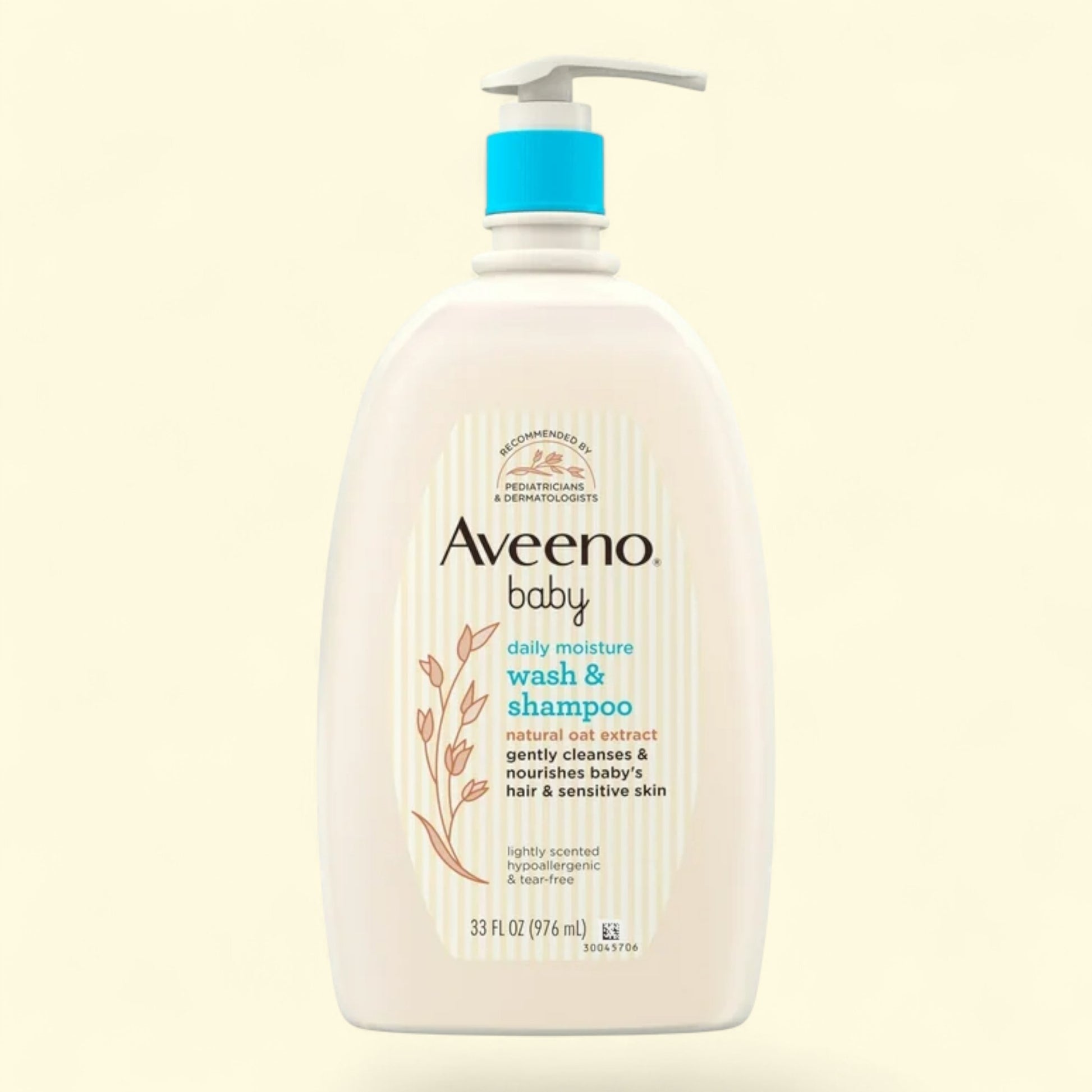 Aveeno baby wash and shampoo bottle on a light beige background