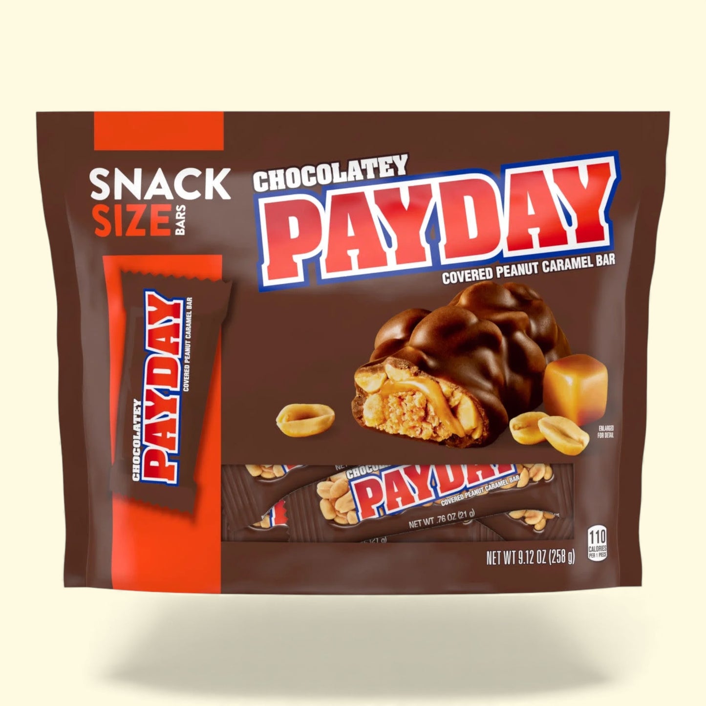 Packaging of Snack Size PayDay chocolate bars on a beige background