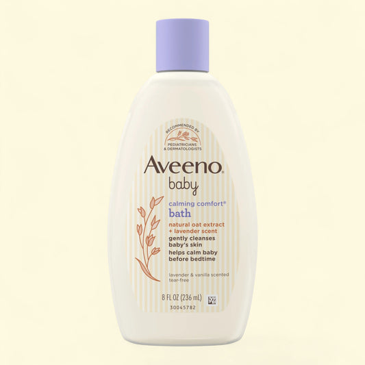 Aveeno baby calming comfort bath bottle on a light beige background