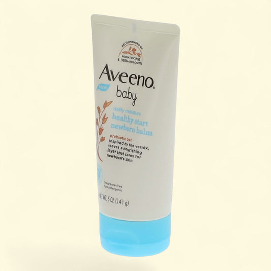 Aveeno baby lotion tube on a light beige background