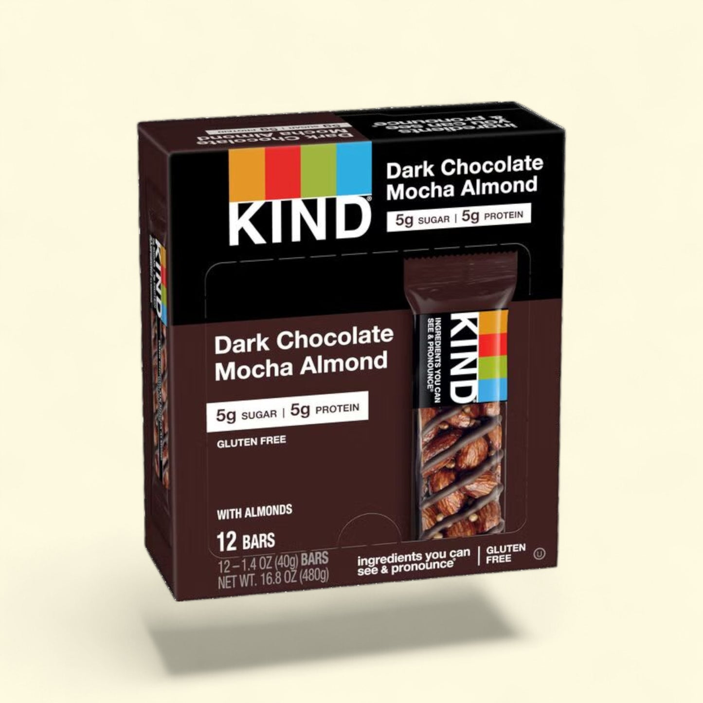 KIND Dark Chocolate Mocha Almond bars on a beige background