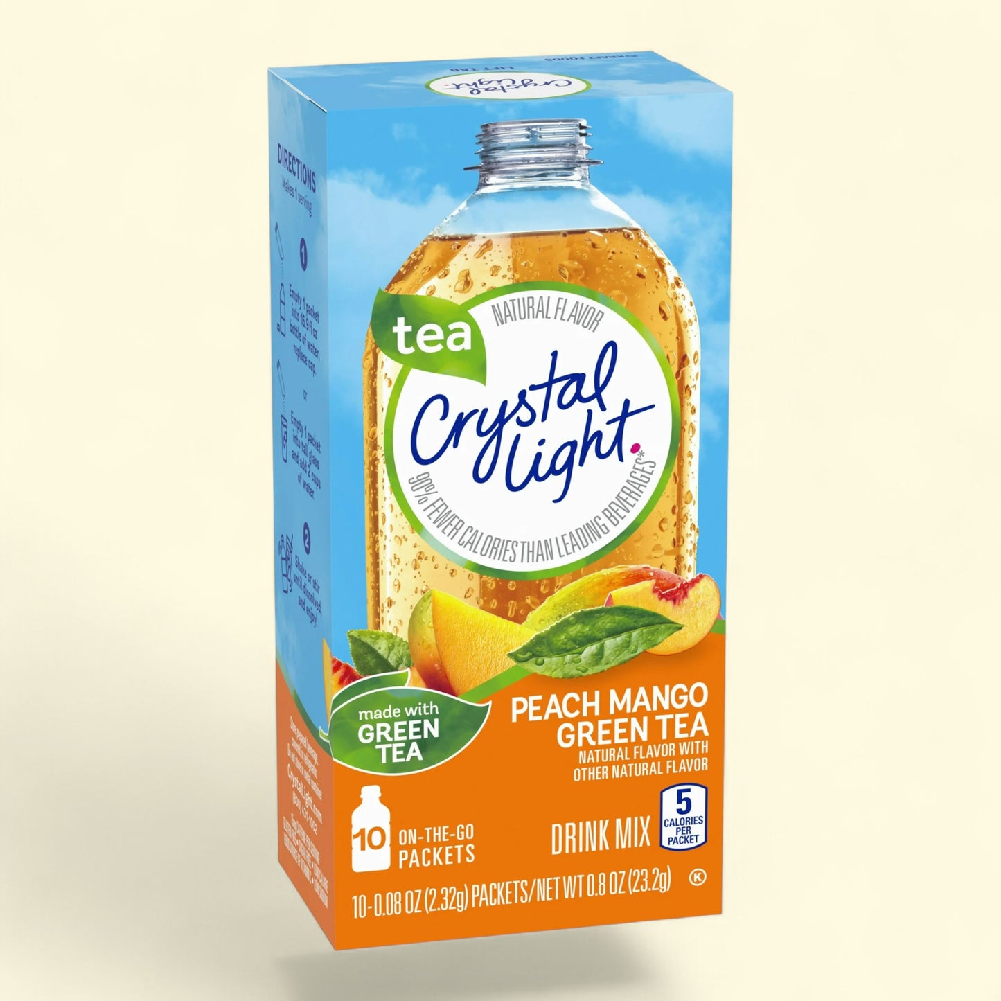 Box of Crystal Light Peach Mango Green Tea drink mix on a beige background