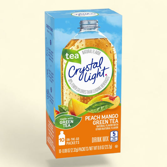 Box of Crystal Light Peach Mango Green Tea drink mix on a beige background