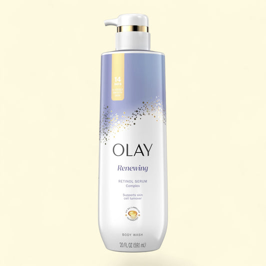 Olay Renewing body wash bottle on a light beige background