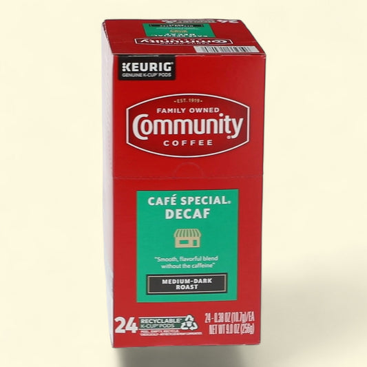 Box of Community Coffee Cafe Special Decaf on a beige background