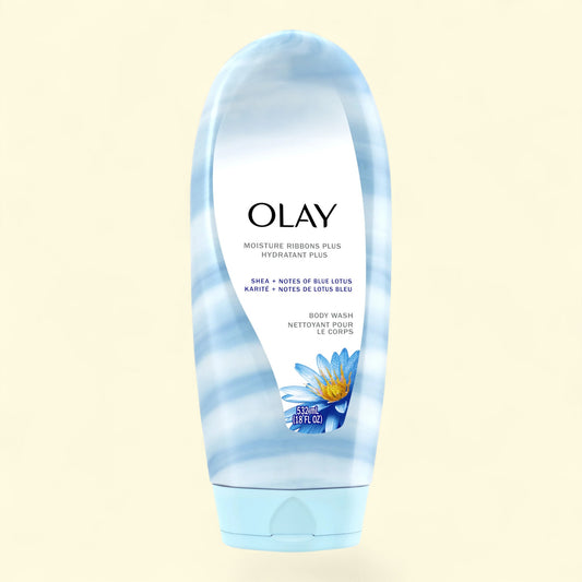 Olay body wash tube with blue floral design on a beige background