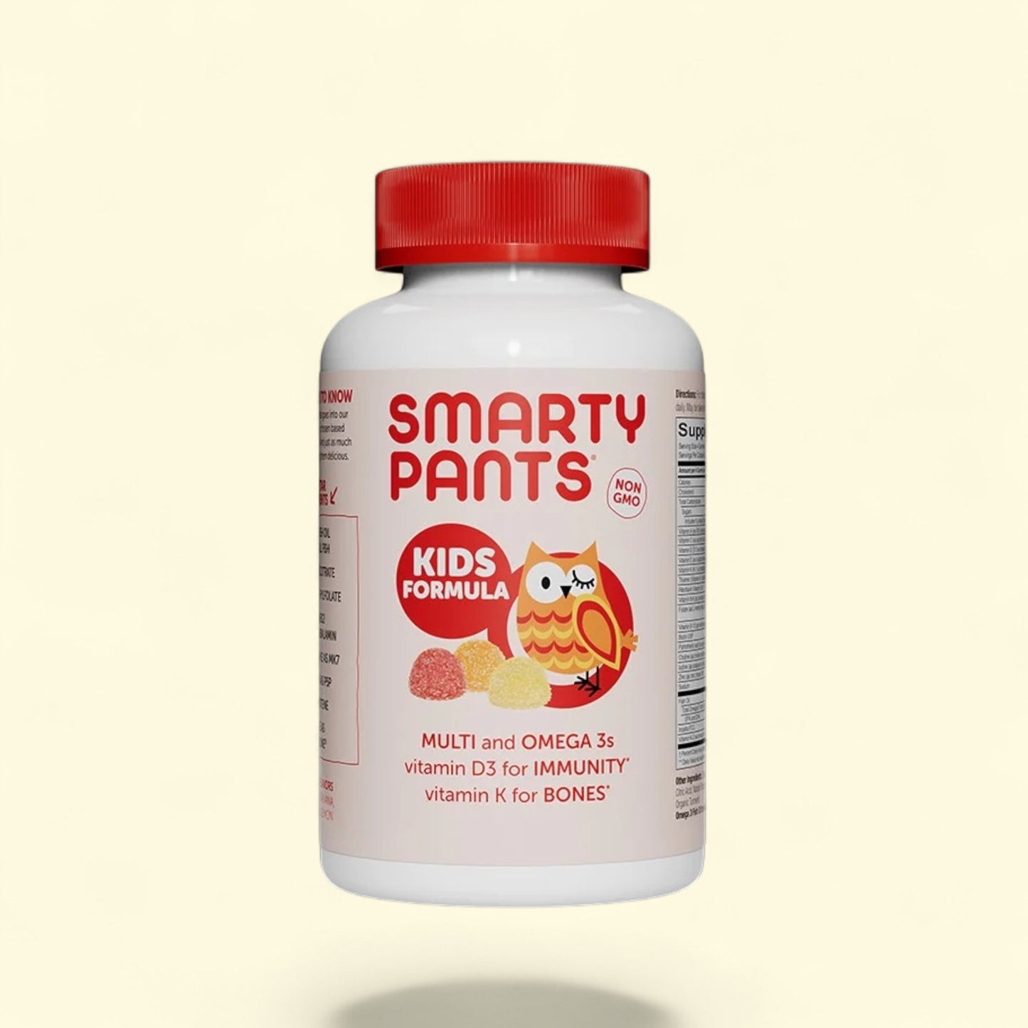 Smarty Pants Kids Formula supplement bottle on a beige background