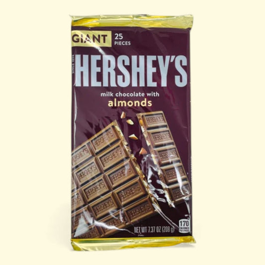 Packaging of Hershey's milk chocolate with almonds on a beige background
