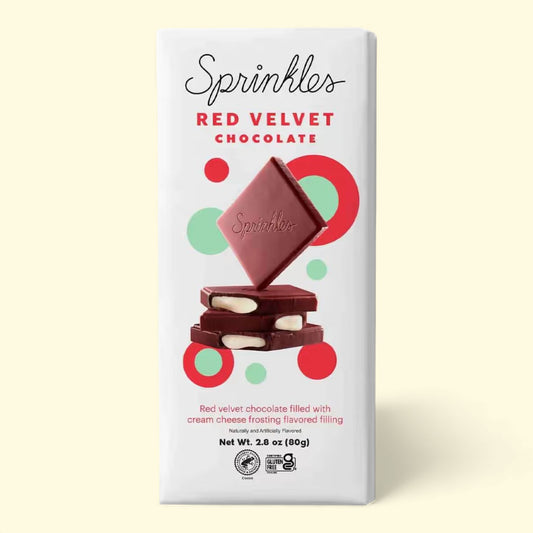 Sprinkles Red Velvet chocolate packaging on a light beige background