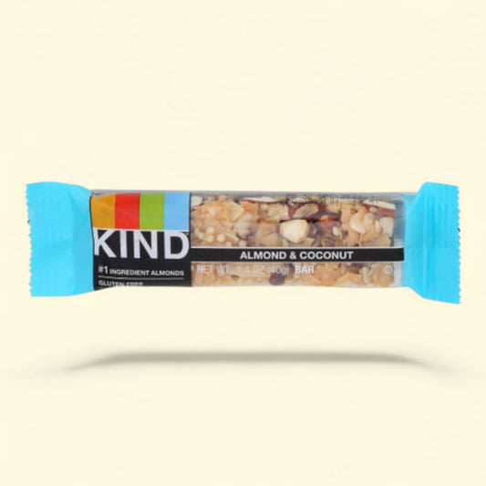 Kind almond and coconut bar on a beige background