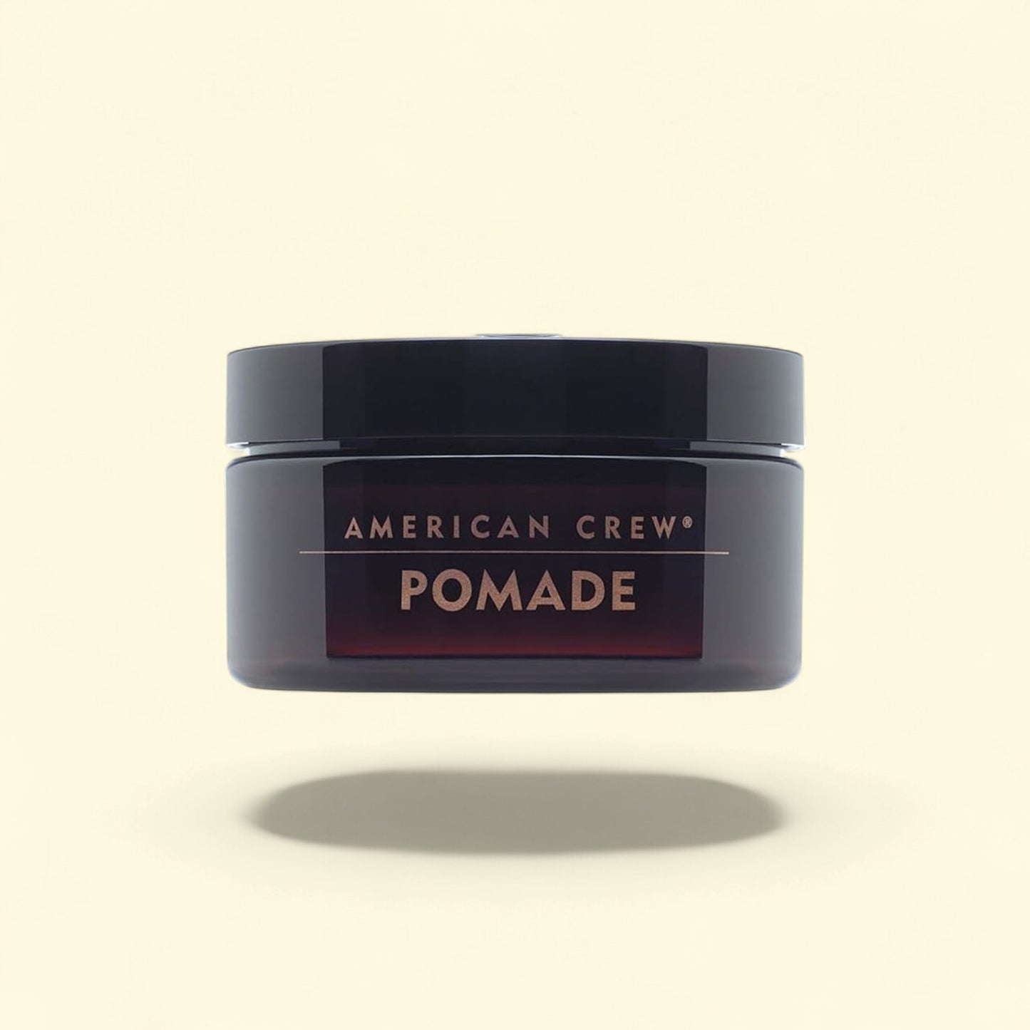 American Crew Hair Pomade for men, 3 oz, medium hold with high shine for textured hair.