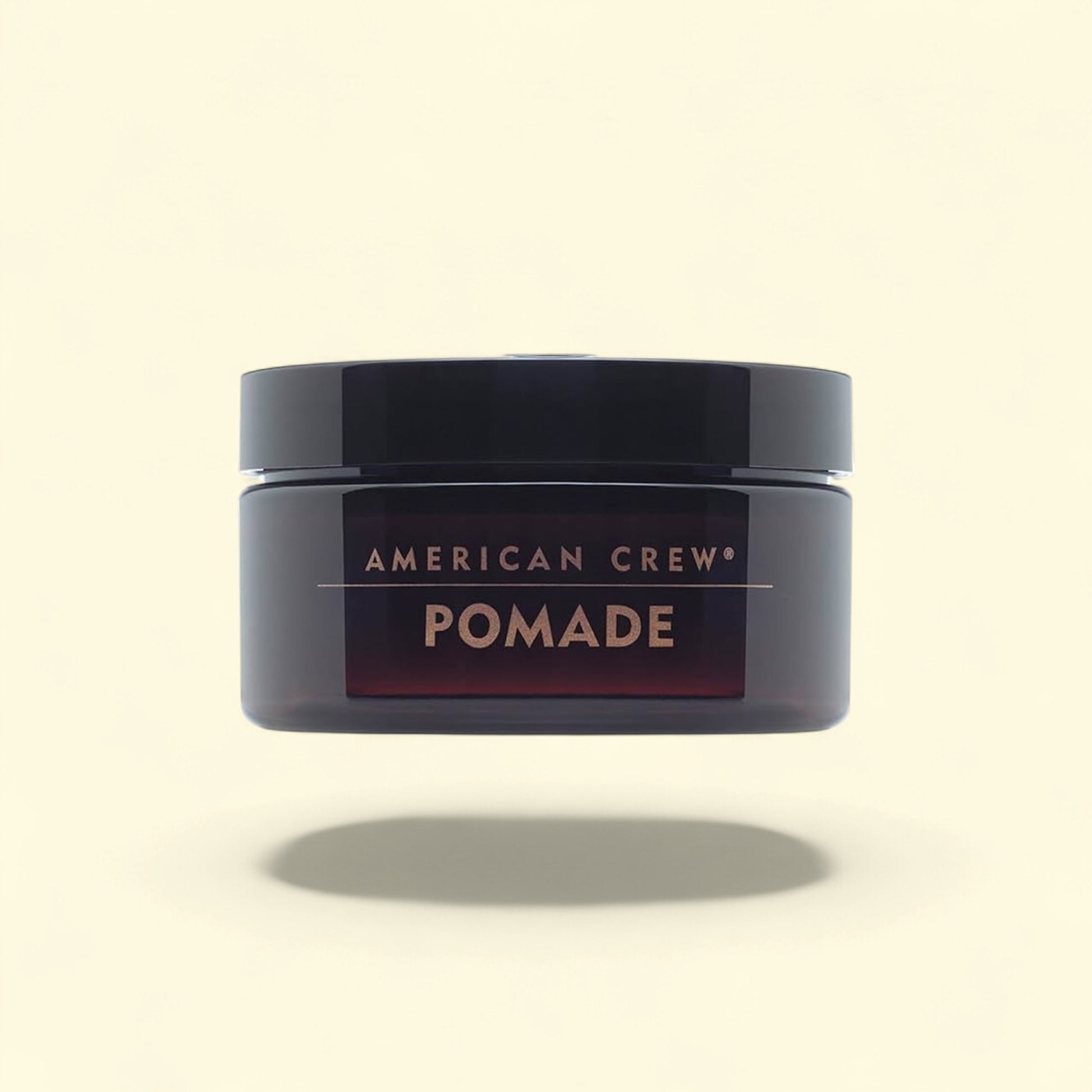 American Crew Hair Pomade for men, 3 oz, medium hold with high shine for textured hair.