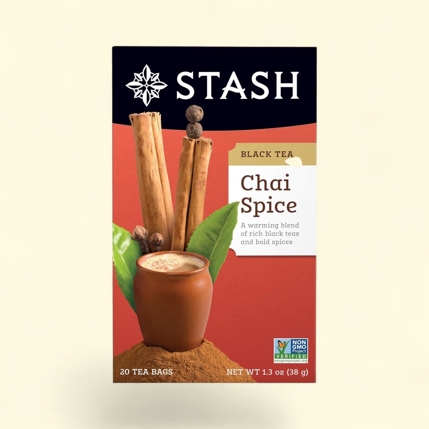 Treatspree Stash Chai Spice Black Tea box with cinnamon sticks, cloves, and a cup of chai.