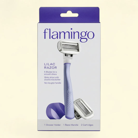 Treatspree Flamingo Women's Razor Shaving Set in lilac. 4-piece set with 5-blade razor, 2 cartridges, and shower holder. Ergonomic grip.