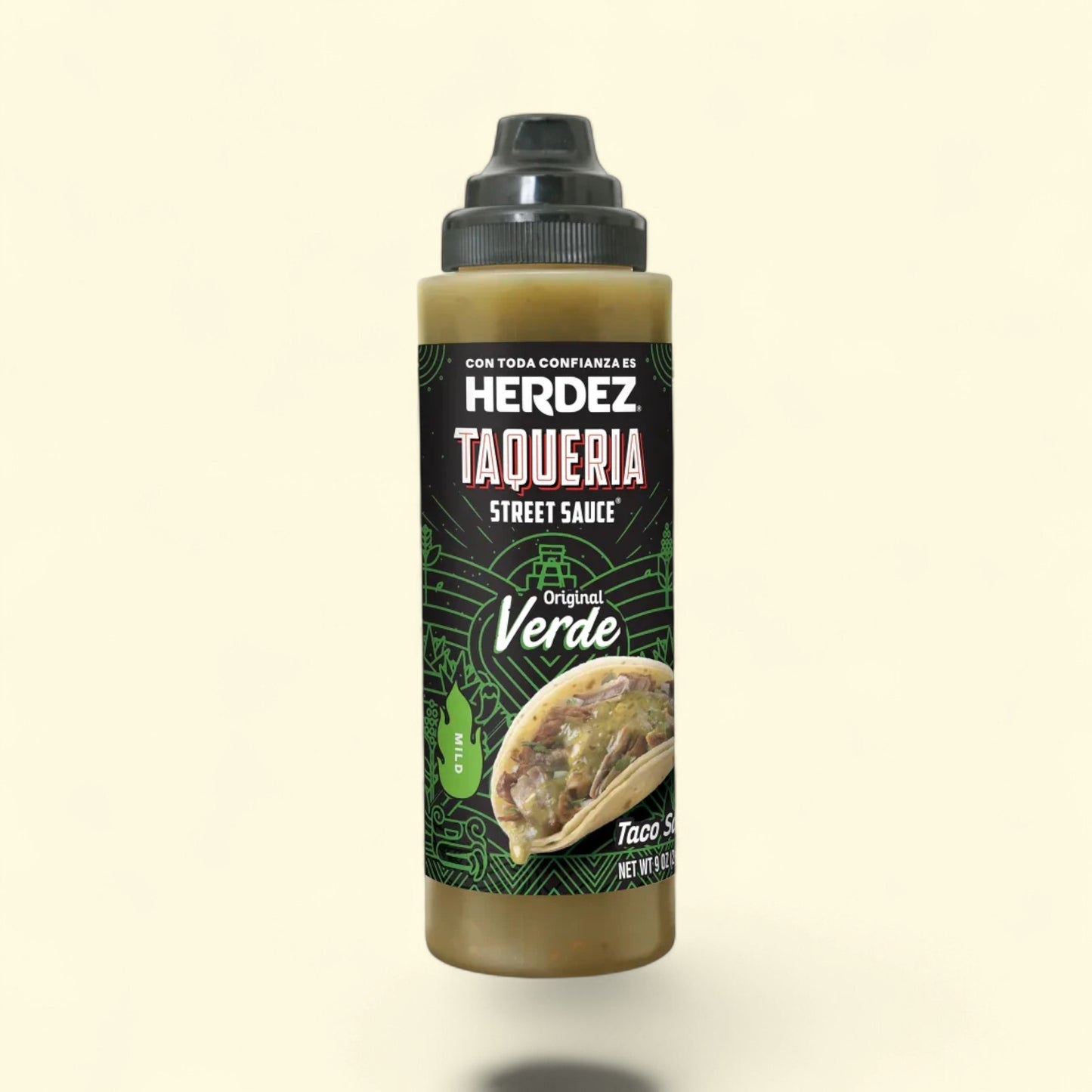 Treatspree Herdez Taqueria Original Verde mild taco sauce in a squeeze bottle, featuring roasted poblano and jalapeno peppers.