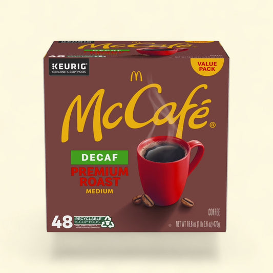 Treatspree McCafe Decaf Premium Roast Medium Coffee K-Cup Pods, 48 count, featuring a red mug of steaming coffee and coffee beans.