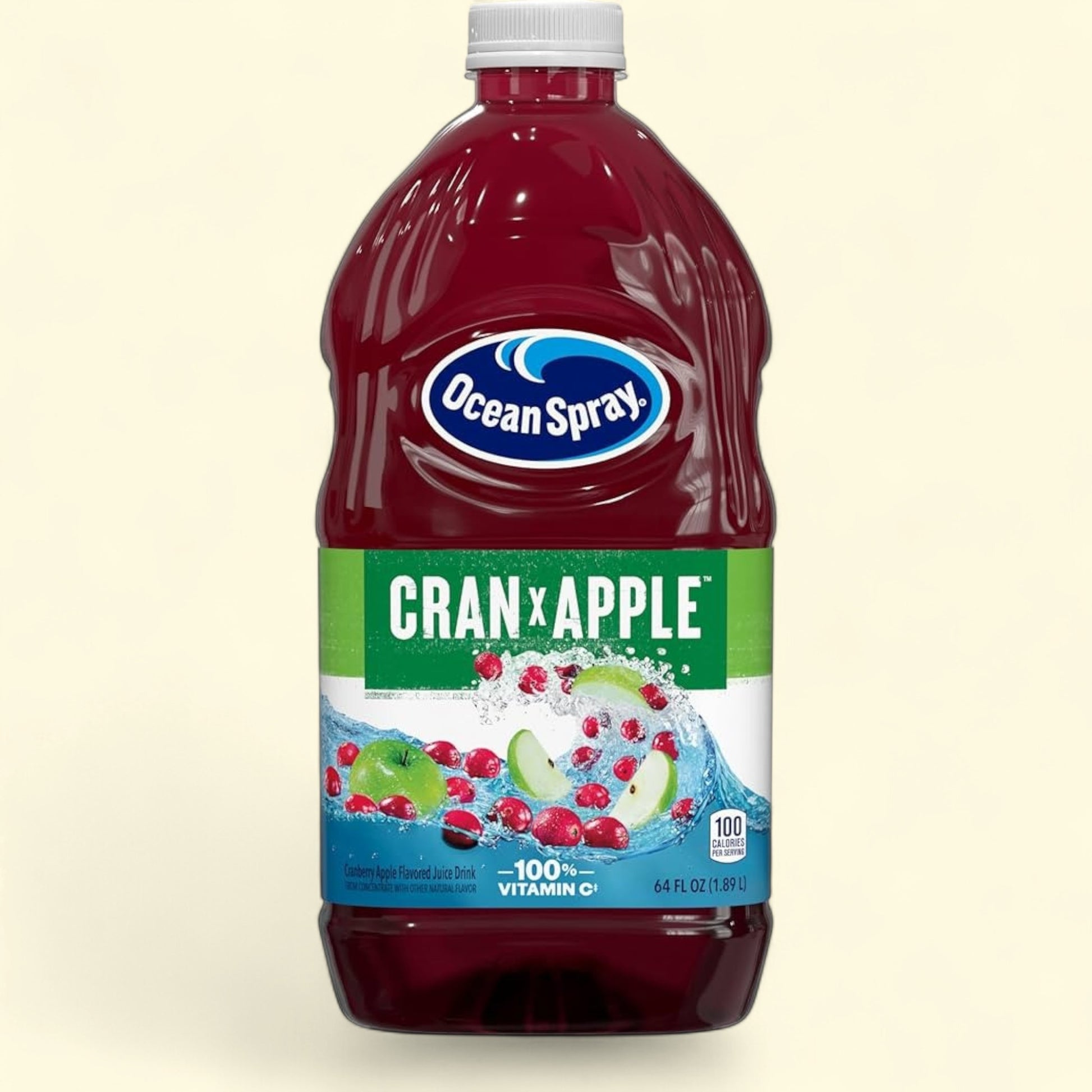 Treatspree Ocean Spray Cran-Apple juice drink in a 64 fl oz bottle. Features whole cranberries and apple slices with splashing water.