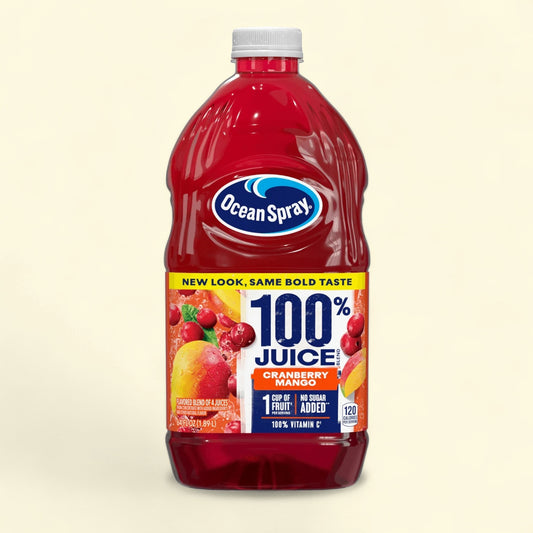 Treatspree Ocean Spray Cranberry Mango 100% Juice Drink, 64 fl oz bottle. Bold red juice with mango and cranberry fruit imagery.