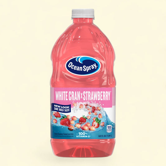 Treatspree Ocean Spray White Cran-Strawberry Juice Drink 64 fl oz bottle with white cap. Pink juice with strawberries and cranberries.
