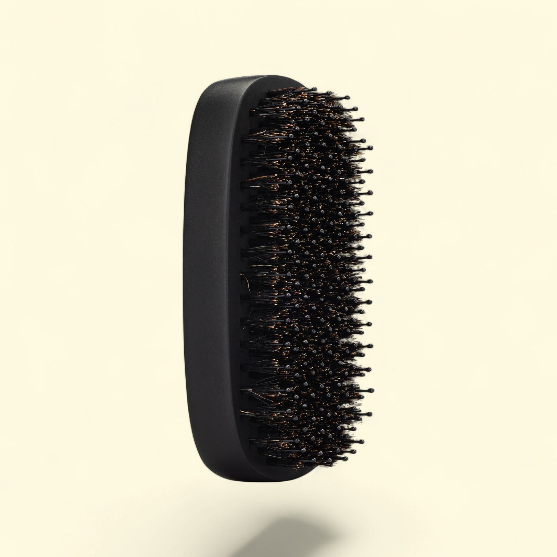 Treatspree black palm brush with boar bristles for short hair and beards, detangles and adds shine.