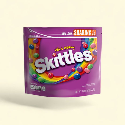 Treatspree Skittles Wild Berry chewy candy sharing size bag with rainbow design. Bite-size candies in purple, pink, green, blue, and red.