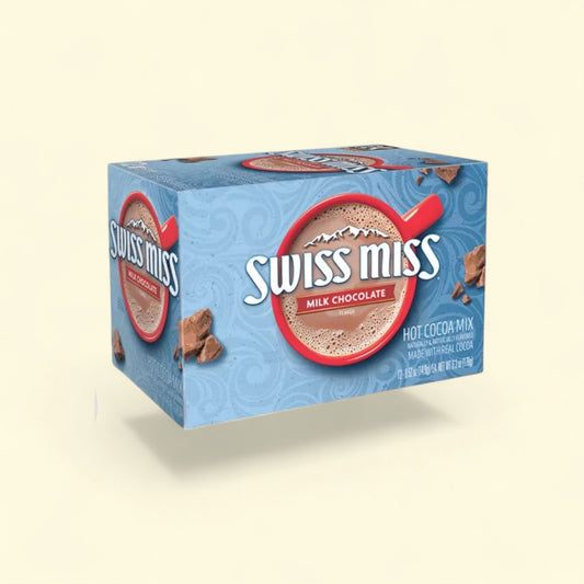 Treatspree Swiss Miss Milk Chocolate Hot Cocoa K-Cup Pods, 44 count box with a glass of hot cocoa topped with whipped cream and chocolate shavings.