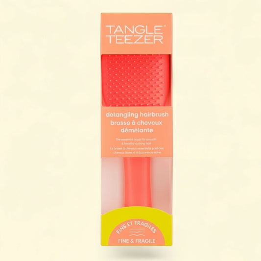 Treatspree Tangle Teezer detangling hairbrush for fine & fragile hair in vibrant orange with Two Tiered Teeth Technology.