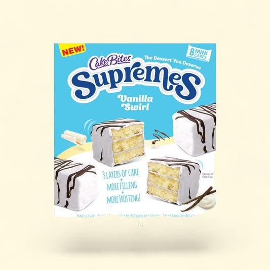 Treatspree CakeBites Vanilla Swirl Supremes: 8 mini cakes with 3 layers of vanilla cake, vanilla cream filling, white chocolate coating, and dark chocolate drizzle.