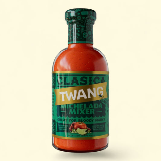 Bottle of Twang Michelada Mixer on a beige background