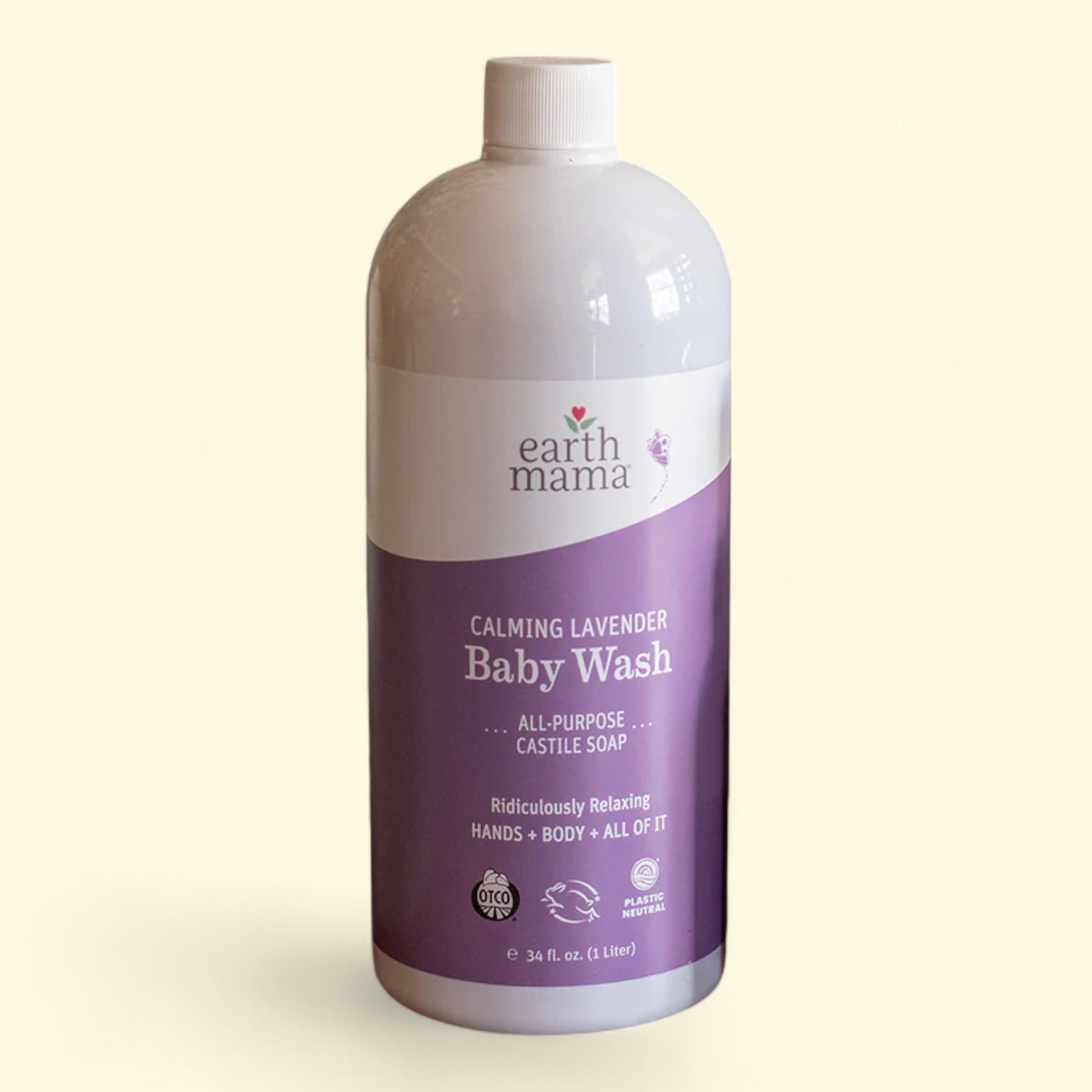 Earth Mama Calming Lavender Baby Wash bottle on a light beige background