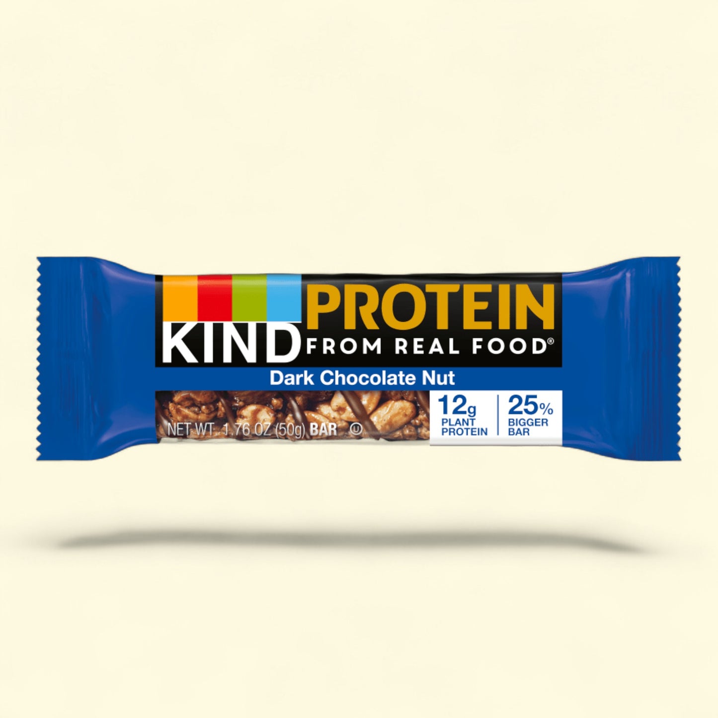 Kind Protein from real food Dark Chocolate Nut bar on a beige background