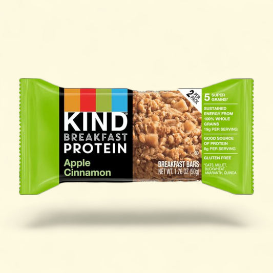 Kind Apple Cinnamon breakfast protein bar packaging on a light beige background
